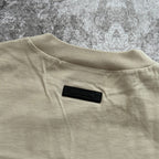 Remera Essentials FW23 "small logo" - Silver cloud